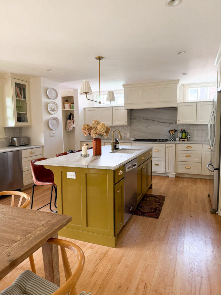 green gold kitchen island, marble quartzite countertops, zellige tile, traditional kitchen design